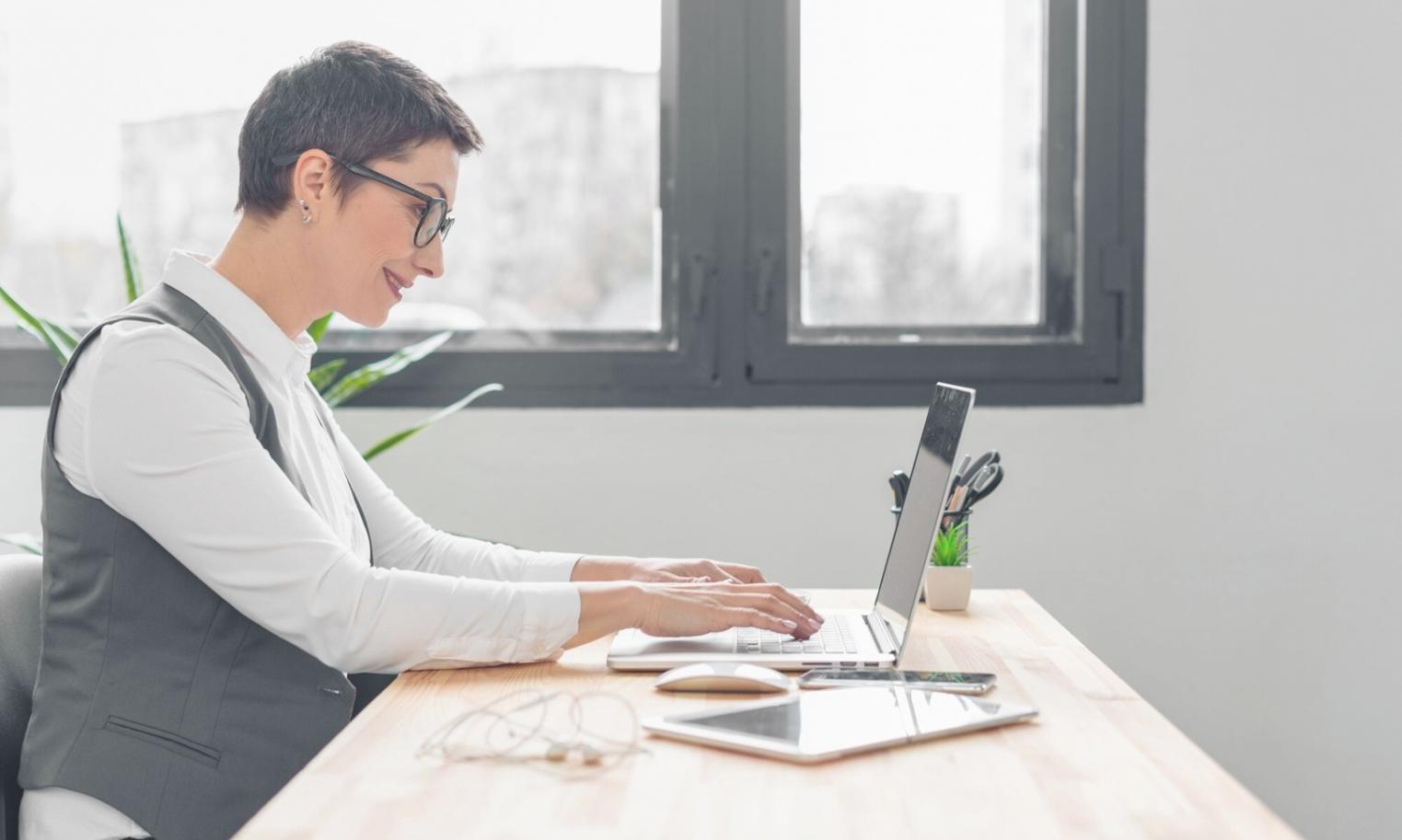 Professional analyzing budget reports